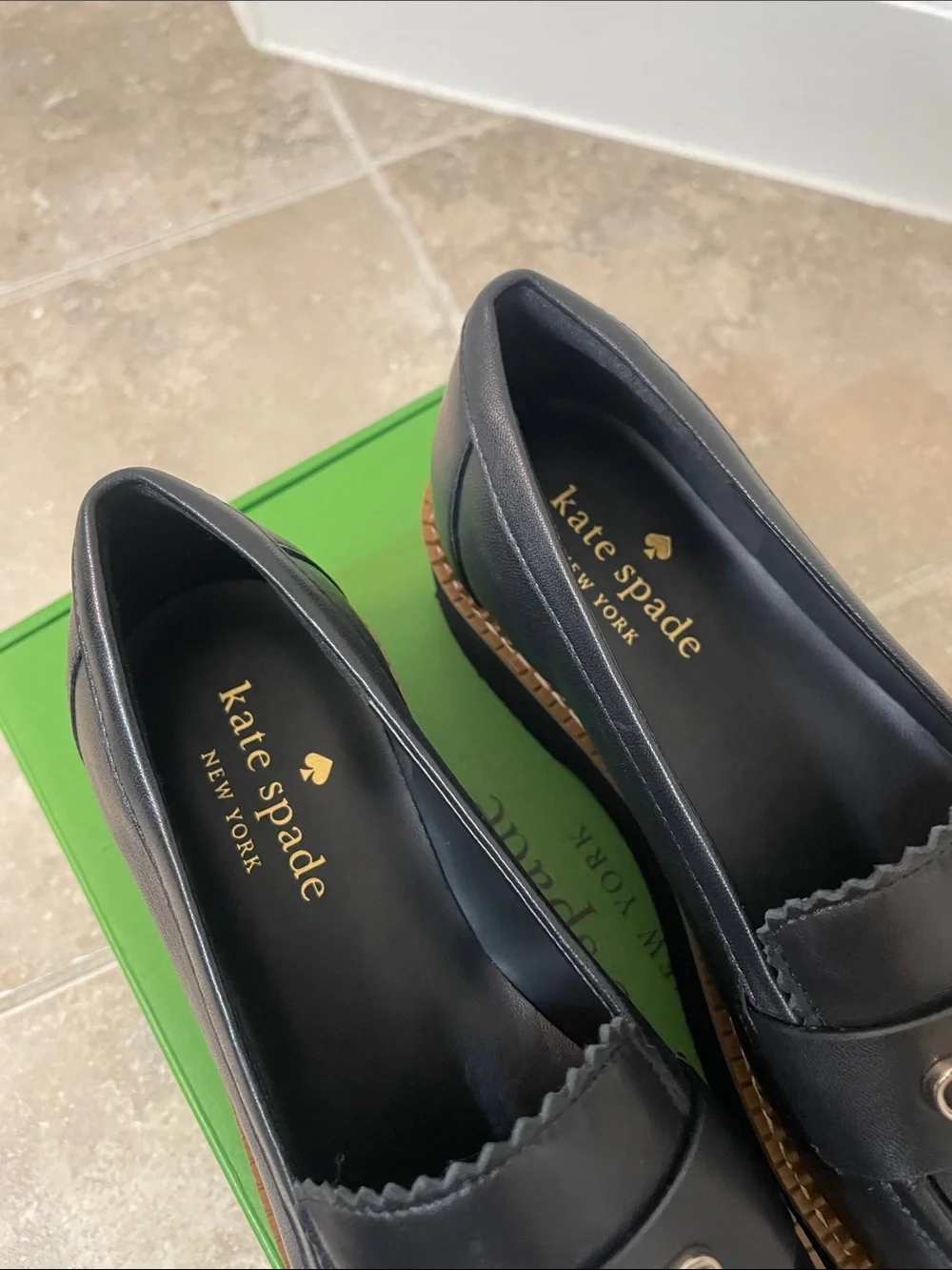 kate spade Black Leather Platform Loafers with Gold Spade Accent